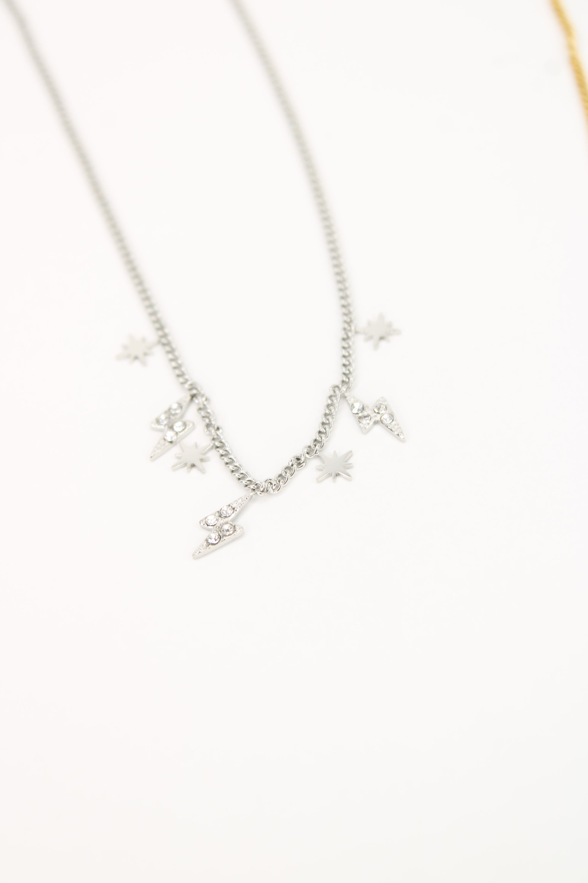 Collier Mélia – Collier Étoiles & Éclairs Scintillants Femme en Acier Inoxydable