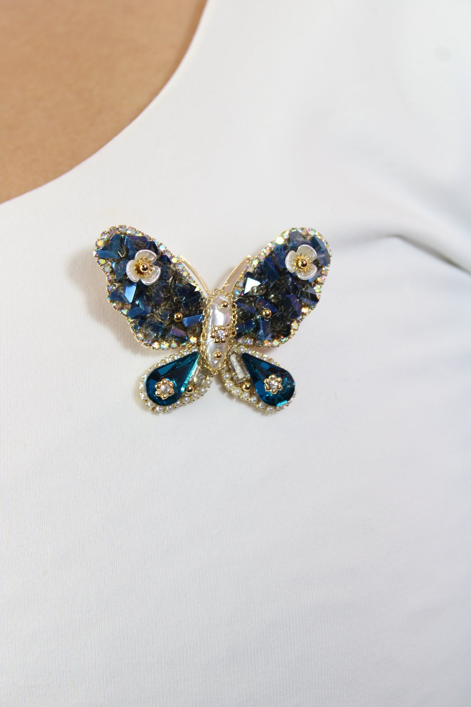 Broche papillon bleu