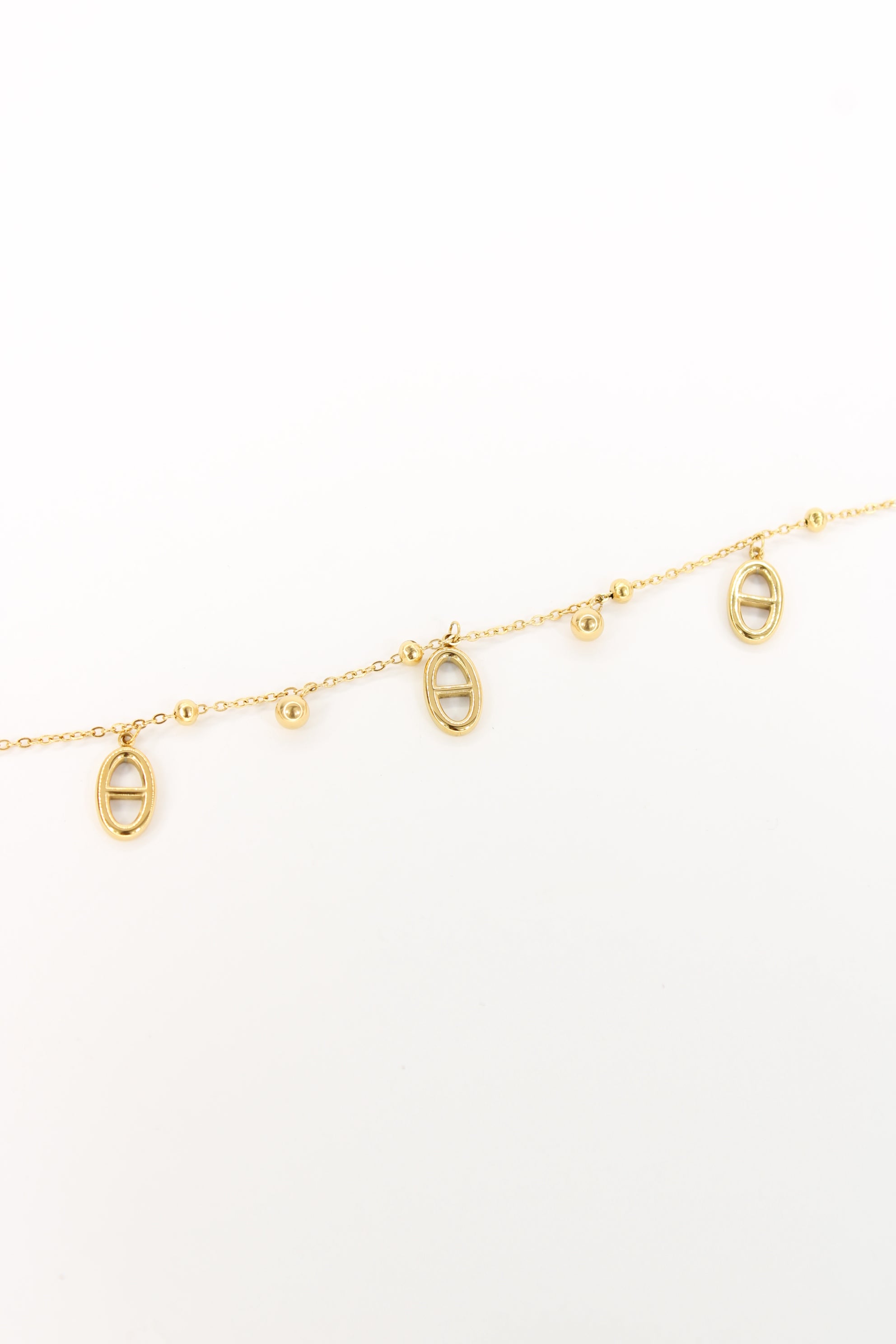 Chaîne de cheville Maty – Bijou doré minimaliste à pendentifs ovales