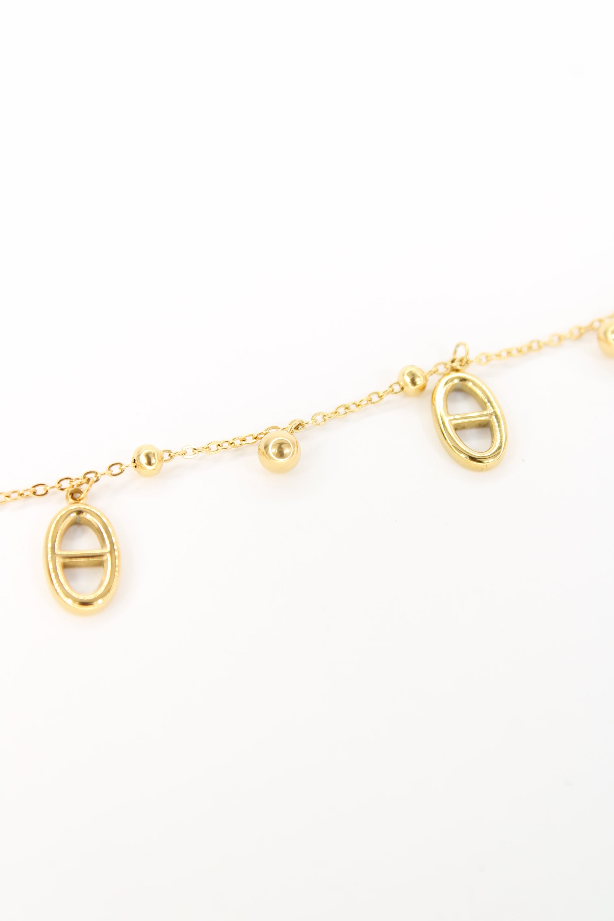 Chaîne de cheville Maty – Bijou doré minimaliste à pendentifs ovales