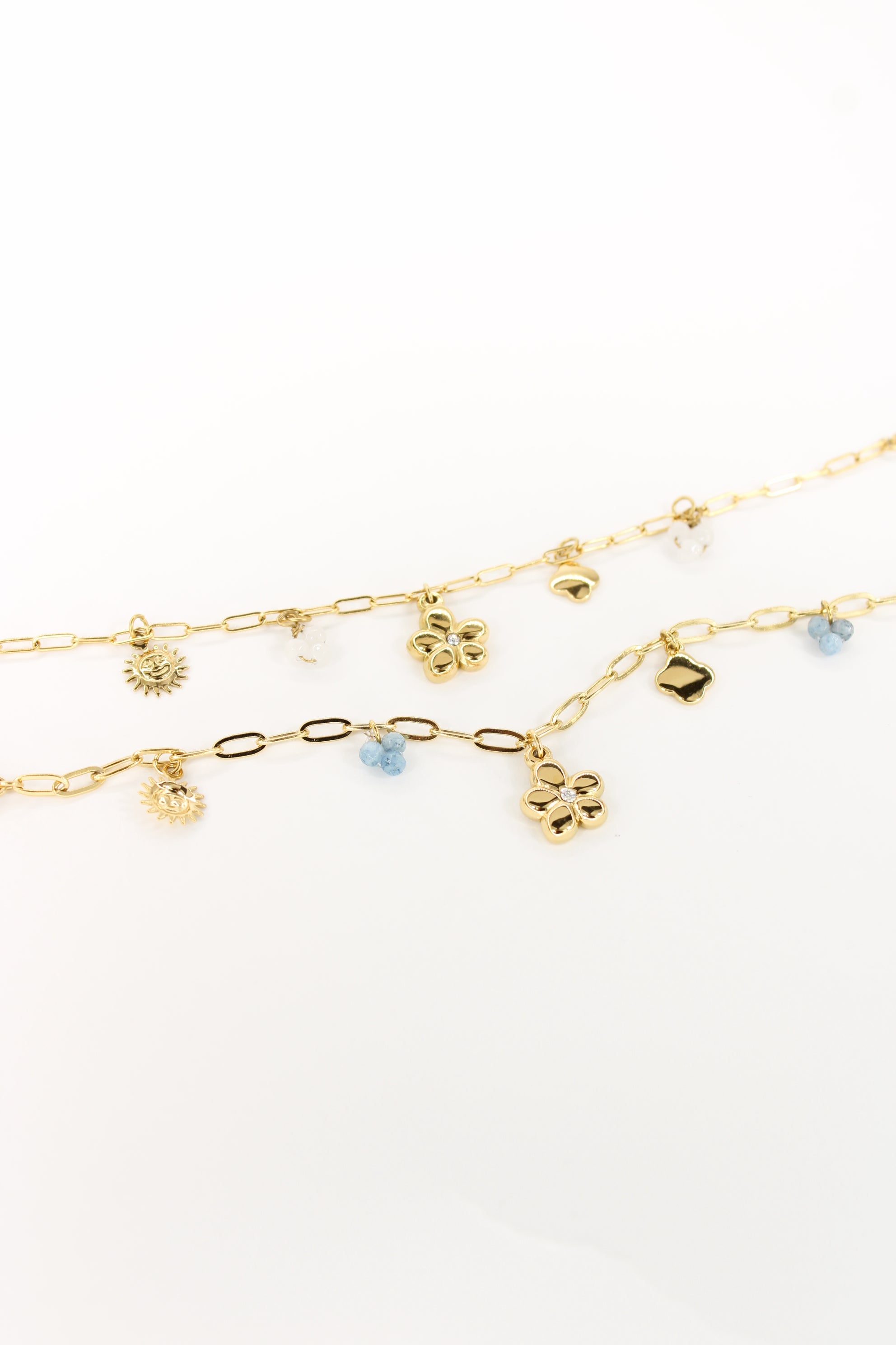 Bracelet Margaux à charms soleil, fleur et cœur en acier inoxydable doré – Bijou femme Langon