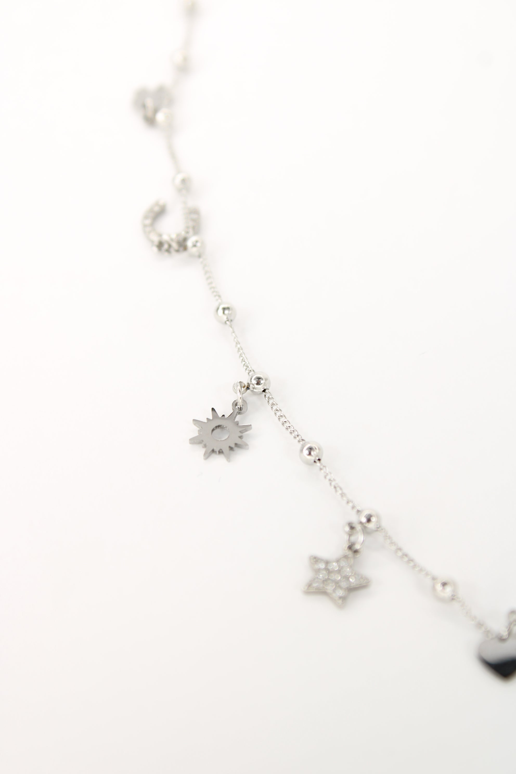 Collier Zoé – Charms étoile, cœur & soleil en acier inoxydable