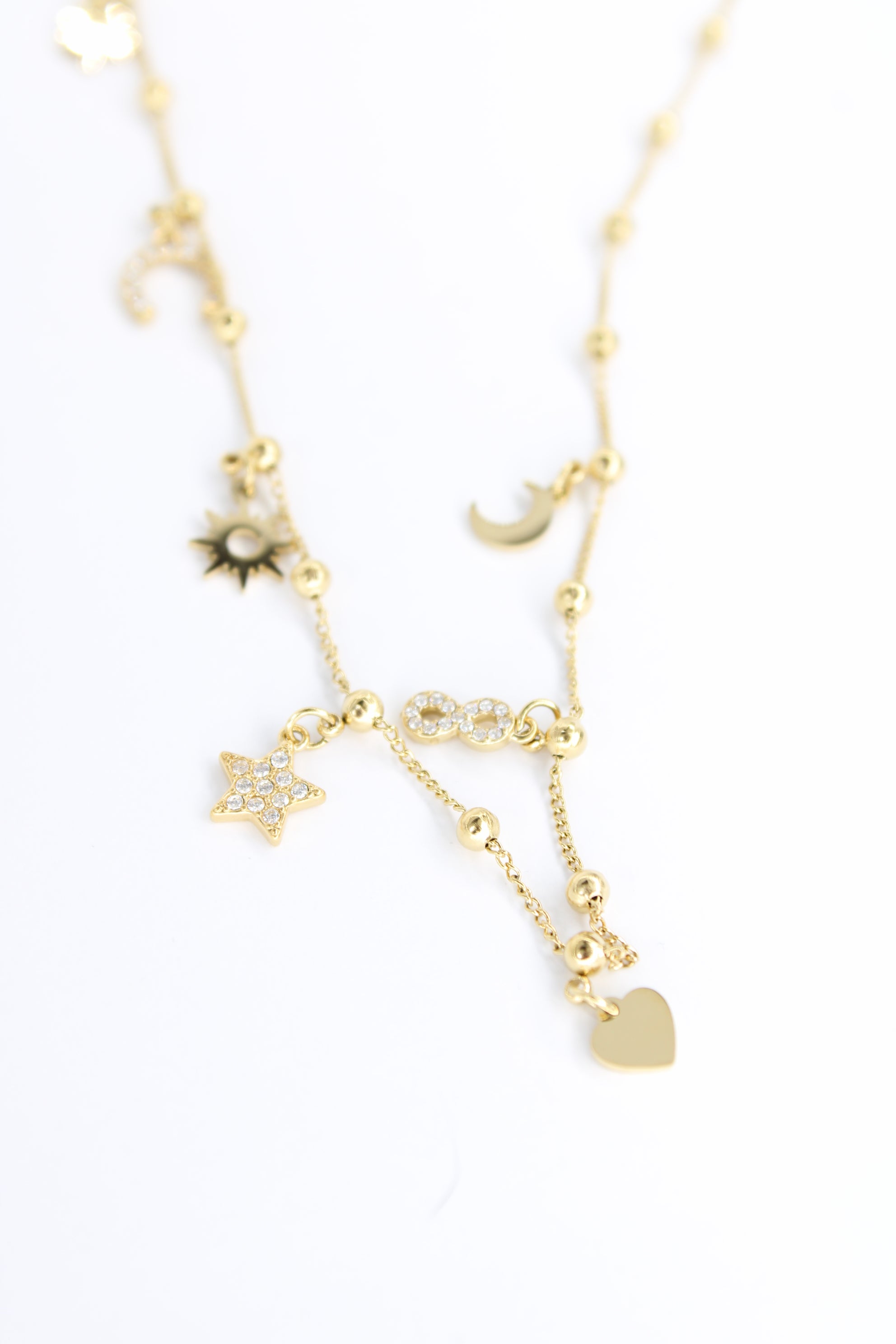 Collier Zoé – Charms étoile, cœur & soleil en acier inoxydable